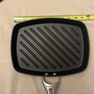 Calphalon Black Nonstick Grill Pan. Used good condition. Heavy press included.